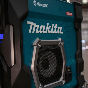 Makita speaker with Bluetooth and XGT branding on a blurred background